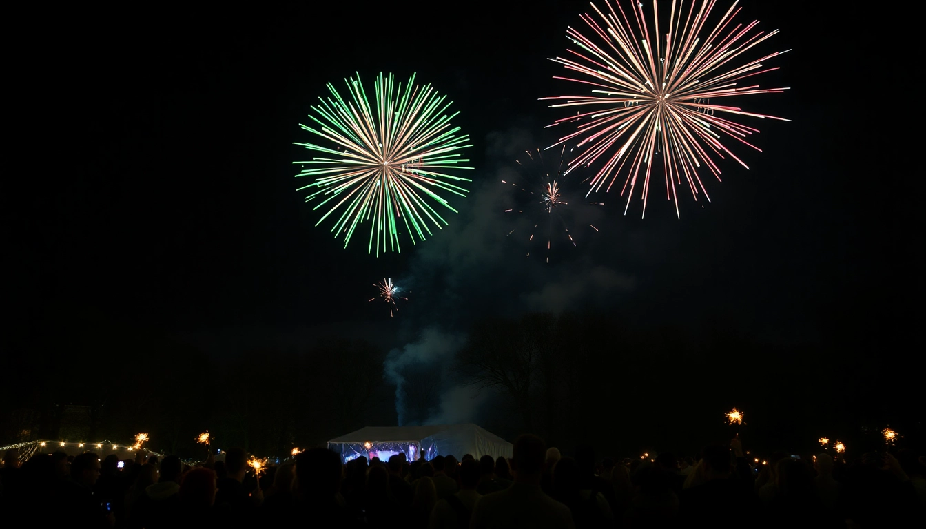 Colorful manchester fireworks bursting in the night sky over a festive crowd.